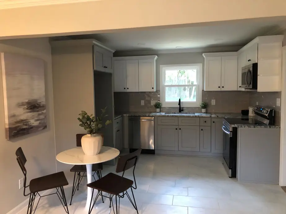 Kitchen corner with a small bistro table and two chairs