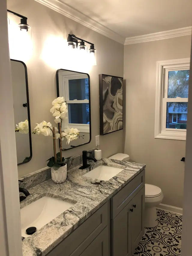 Bathroom double vanity with a granite top